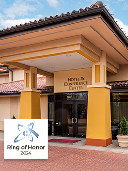 A hotel building with the text "Hotel & Conference Center" - Ring of Honor 2024